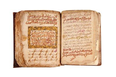 Lot 383 - TWO MAGHRIBI MANUSCRIPTS: MUHAMMAD AL-JAZULI (D.1472)'S DALA’IL AL-KHAYRAT