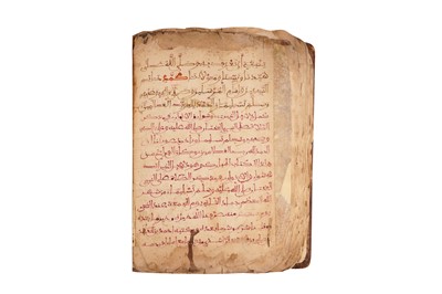 Lot 383 - TWO MAGHRIBI MANUSCRIPTS: MUHAMMAD AL-JAZULI (D.1472)'S DALA’IL AL-KHAYRAT