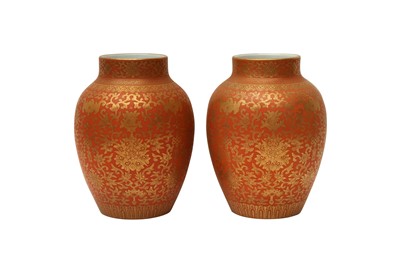 Lot 808 - A PAIR OF CHINESE CORAL-GLAZED GILT-DECORATED VASES