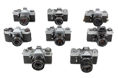Lot 1077 - Eight Praktica and Zenit Cameras.