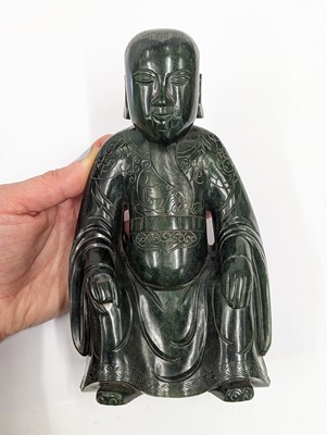 Lot 184 - A CHINESE SPINACH-GREEN JADE FIGURE OF AN IMMORTAL