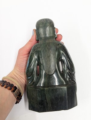 Lot 184 - A CHINESE SPINACH-GREEN JADE FIGURE OF AN IMMORTAL