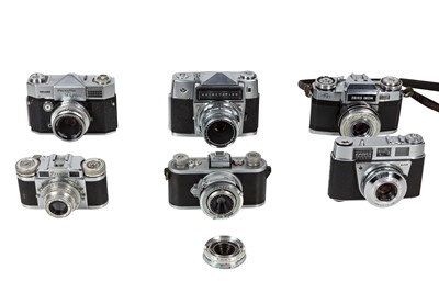 Lot 1113 - Six midcentury cameras.