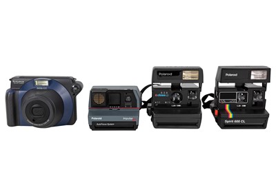 Lot 1248 - Four Polaroid Instant Print Cameras.