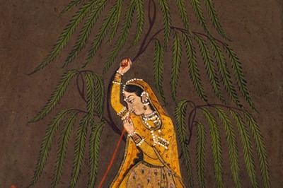 Lot 72 - A PENSIVE LADY SMOKING A HUQQA IN THE WILDERNESS