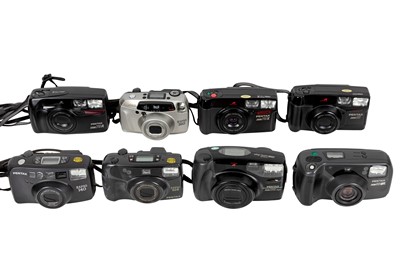 Lot 75 - Eight Pentax point and shoot cameras.