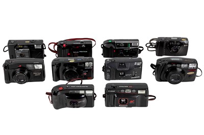 Lot 1129 - Ten point and shoot cameras.