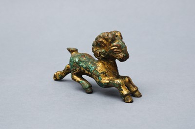Lot 318 - A CHINESE GILT-BRONZE MODEL OF A RAM