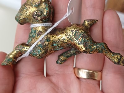 Lot 318 - A CHINESE GILT-BRONZE MODEL OF A RAM