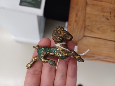 Lot 318 - A CHINESE GILT-BRONZE MODEL OF A RAM