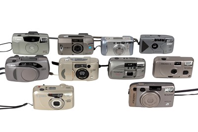 Lot 1127 - Ten point and shoot cameras.