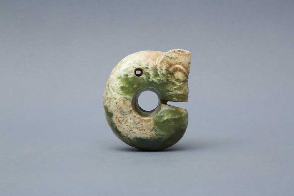 Lot 317 - A SMALL ARCHAIC JADE CARVING OF A 'PIG DRAGON', ZHULONG