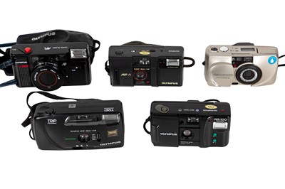 Lot 1083 - Five Olympus point and shoot cameras.