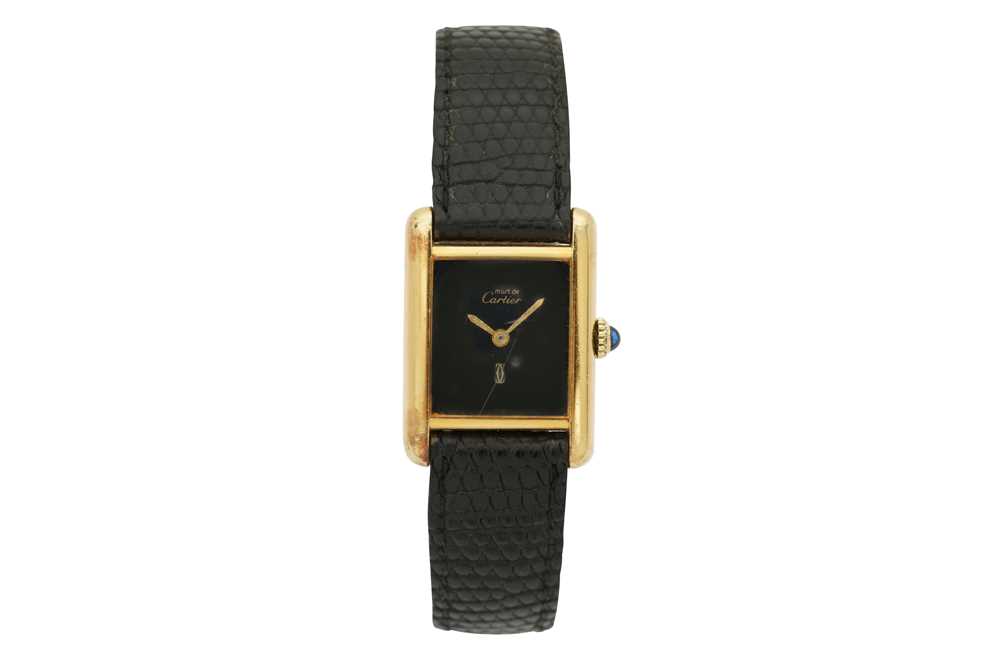 Lot 64 - CARTIER. A MUST DE CARTIER VERMEIL TANK WRISTWATCH