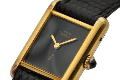 Lot 64 - CARTIER. A MUST DE CARTIER VERMEIL TANK WRISTWATCH