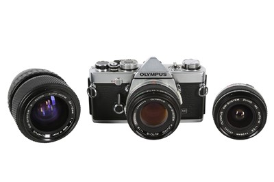 Lot 1066 - An Olympus OM1n Outfit.
