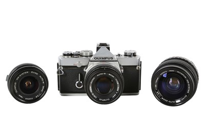 Lot 1065 - An 3-Lens Olympus OM1 Outfit.