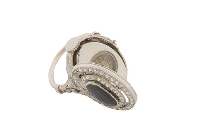 Lot 47 - A SAPPHIRE AND DIAMOND WATCH RING