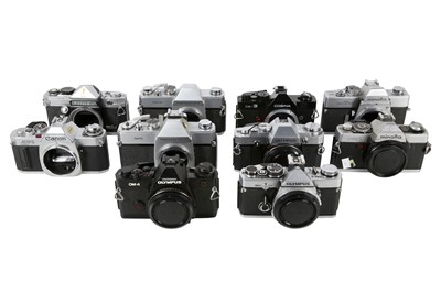 Lot 1118 - Ten 35mm SLR cameras for parts.