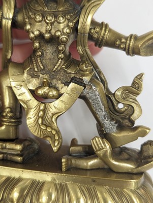 Lot 292 - A SINO-TIBETAN GILT-BRONZE FIGURE OF YAMANTAKA