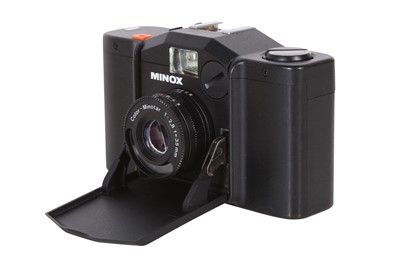 Lot 1016 - A Minox GL camera.