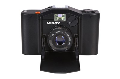 Lot 1016 - A Minox GL camera.