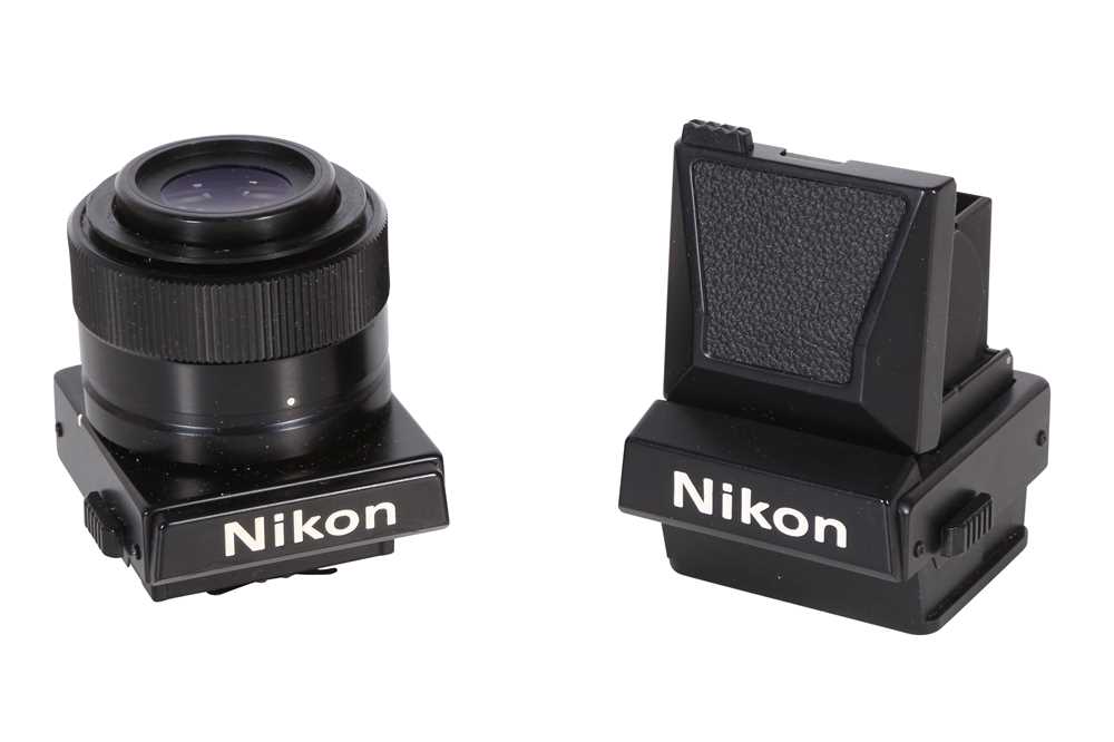 Lot 216 - A pair of Nikon interchangeable prisms.