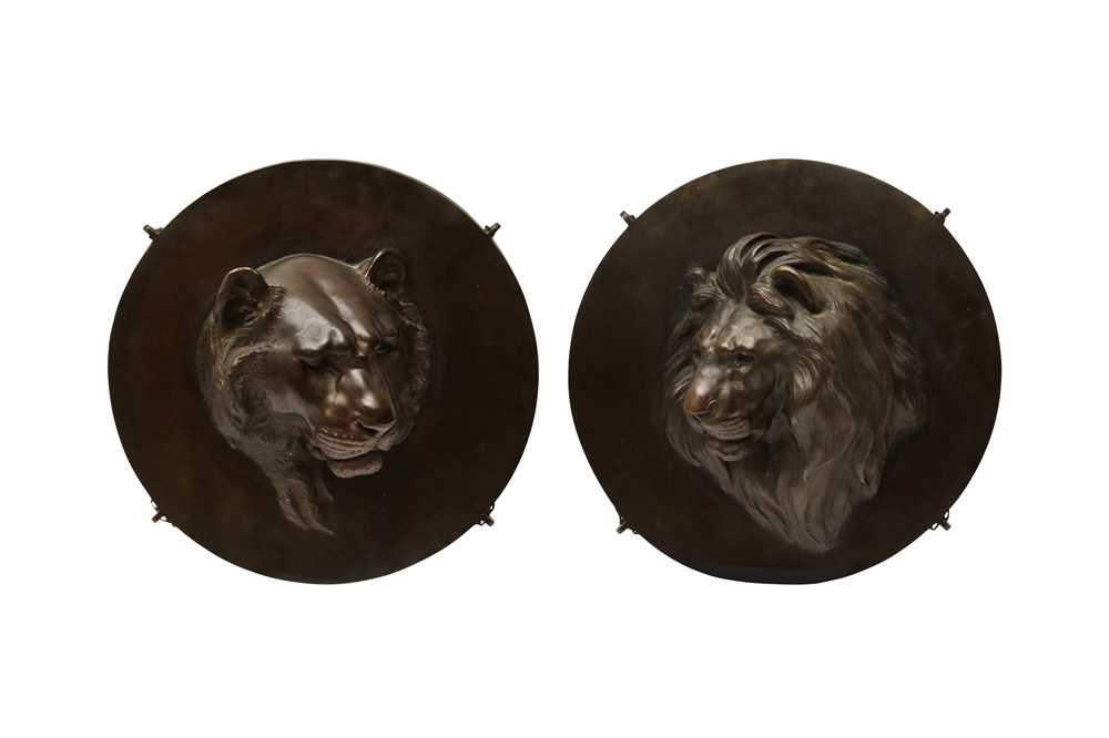 Lot 1014 - A PAIR OF JAPANESE 'LIONS' MEDALLIONS