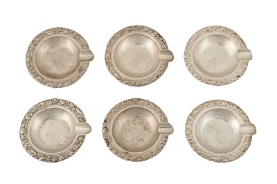 Lot 134 - A SET OF SIX MID-20TH CENTURY INDONESIAN SILVER ASHTRAYS