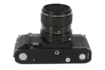 Lot 309 - A 4-Lens Canon New F-1 Outfit.