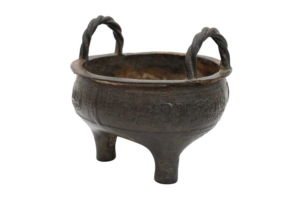Lot 605 - A CHINESE BRONZE TRIPOD CENSER