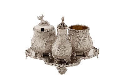 Lot 365 - A Victorian sterling silver three-piece cruet set on stand, London 1883 by William Leuchars