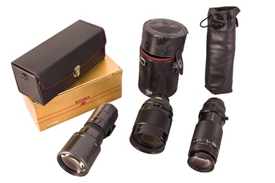 Lot 1331 - Three Nikon telephoto lenses.