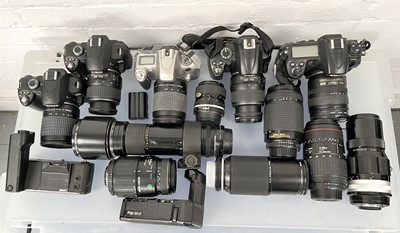 Lot 1102 - Large Collection of Nikon Cameras & Lenses.