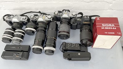 Lot 1073 - Canon Film Cameras & Lenses.