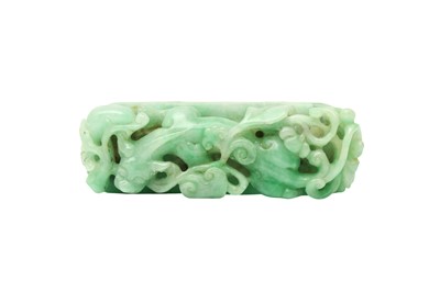 Lot 949 - A CHINESE APPLE-GREEN JADE 'CHILONG' PAPERWEIGHT