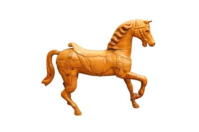 Lot 535 - A CARVED PINE CAROUSEL-INSPIRED HORSE