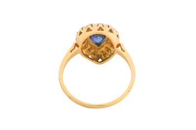 Lot 109 - A SAPPHIRE AND DIAMOND PEAR-SHAPED RING