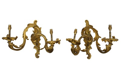 Lot 338 - A PAIR OF GILT BRONZE ORMULU TWIN BRANCH WALL SCONCES IN THE ROCOCO MANNER