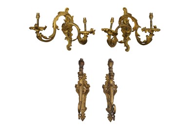 Lot 84 - A PAIR OF GILT BRONZE ORMOLU TWIN BRANCH WALL SCONCES IN THE ROCOCO MANNER