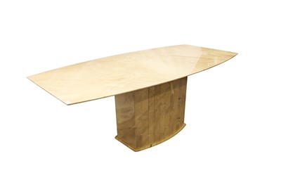 Lot 328 - A KESTERPORT TRAVERTINE MARBLE DINING TABLE