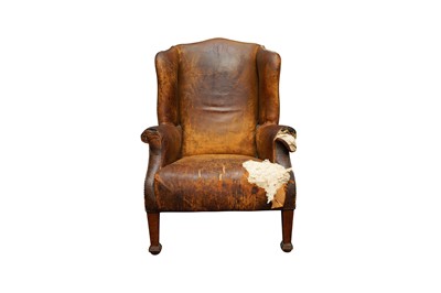 Lot 139 - A 19TH CENTURY HUMPBACK WING ARMCHAIR