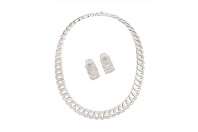 Lot 260 - CARTIER Ι A DIAMOND 'C' NECKLACE AND EARRING SUITE