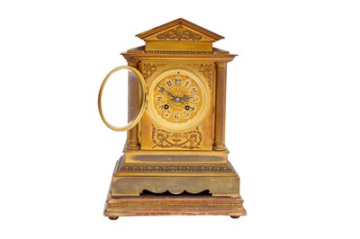 Lot 448 - A FRENCH EARLY 20TH CENTURY BRASS CLOCK GARNITURE SET OF ARCHITECTURAL FORM