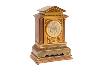 Lot 448 - A FRENCH EARLY 20TH CENTURY BRASS CLOCK GARNITURE SET OF ARCHITECTURAL FORM