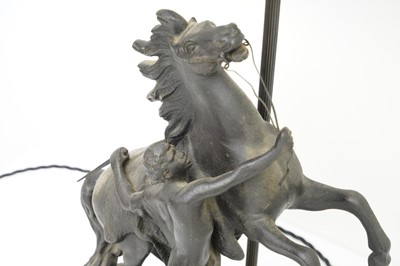 Lot 653 - A PAIR OF SPELTER MARLEY HORSE TABLE LAMPS