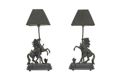 Lot 653 - A PAIR OF SPELTER MARLEY HORSE TABLE LAMPS