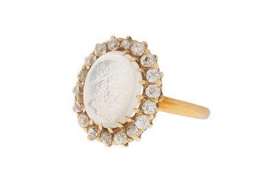 Lot 30 - A MOONSTONE AND DIAMOND CLUSTER RING