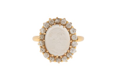 Lot 30 - A MOONSTONE AND DIAMOND CLUSTER RING