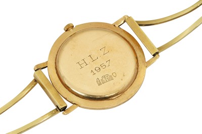 Lot 45 - AN 18K YELLOW GOLD SANZ WATCH